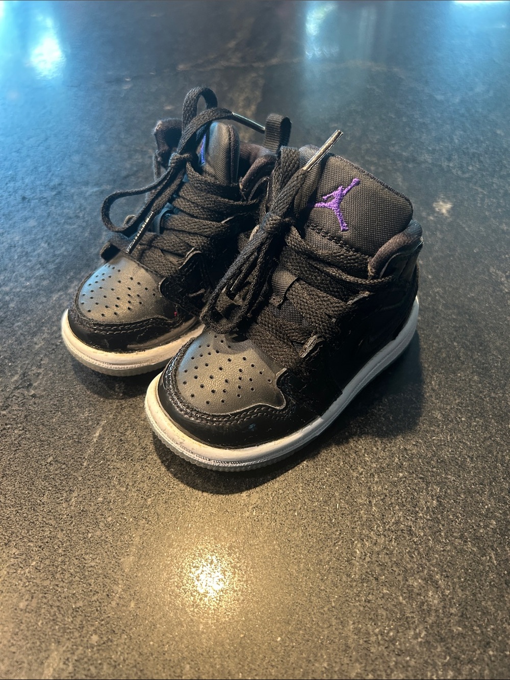 Nike Kids Black High-Top Sneakers with Purple Logo